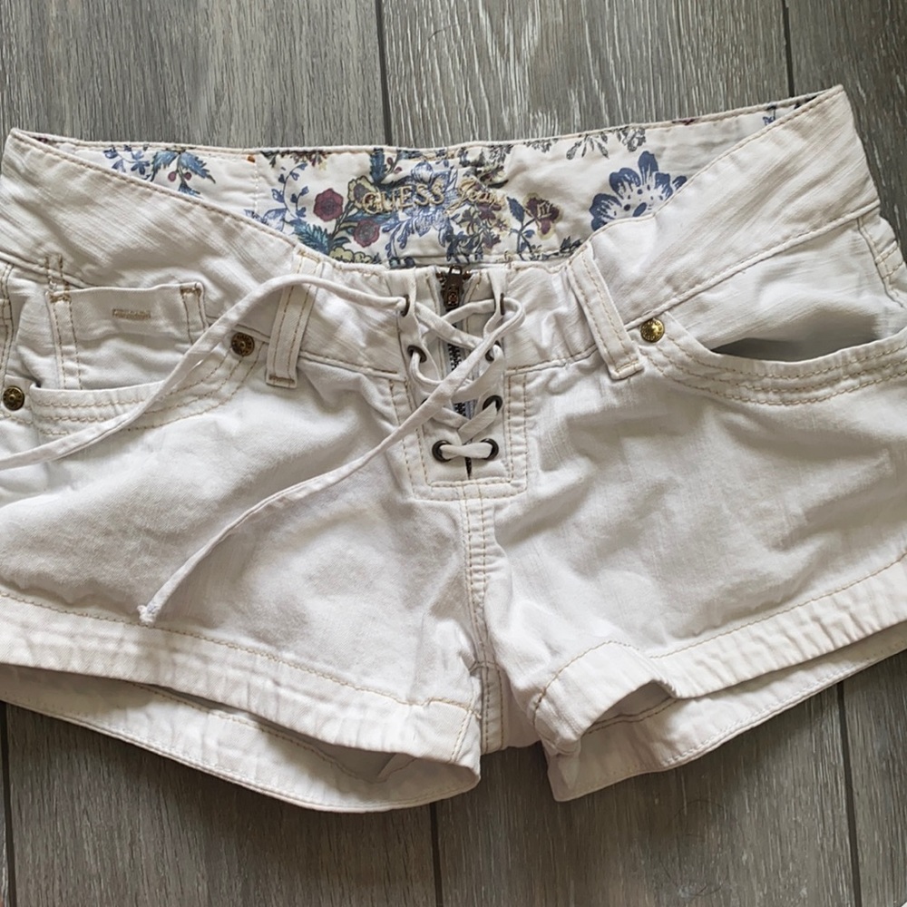 Guess low waisted white shorts